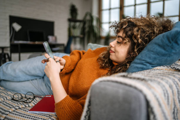 istock Enjoys morning on sofa in living room 1313329523
