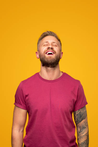 istock Glad bearded guy laughing with closed eyes 1313330965