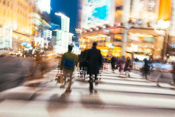 Japan Tokyo People on crossing in Ginza shopping district, Tokyo, Japan.