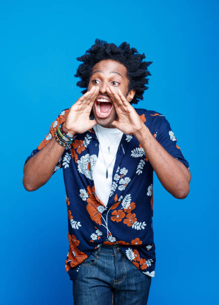 istock Man in hawaiian shirt shouting 1313337105