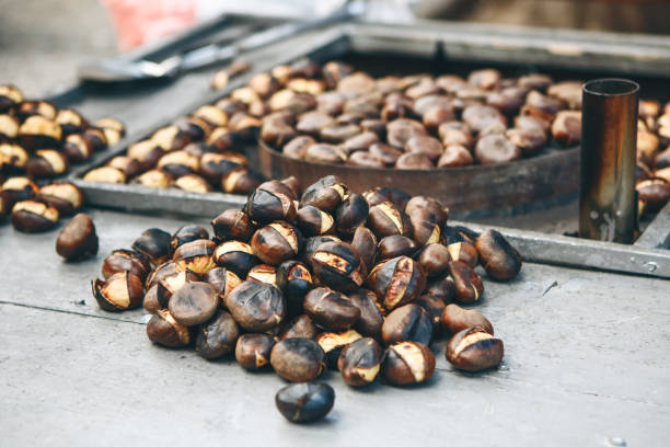 istock Sale of roasted chestnuts 1313339800