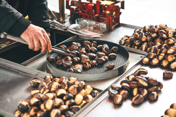 istock Sale of roasted chestnuts 1313340042