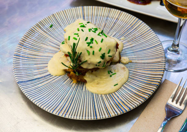 istock Dish of pork with Roquefort cheese sauce with potatoes 1313340186