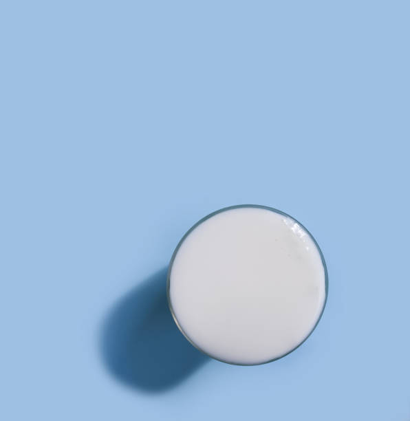istock glass of milk on a colored background 1313340319
