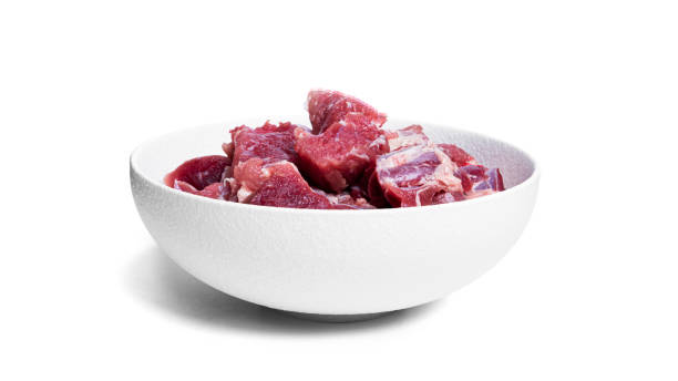 istock Pieces of raw pork isolated on a white background 1313341519