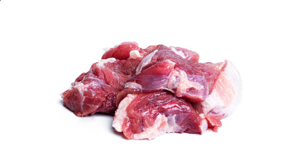 istock Pieces of raw pork isolated on a white background 1313342735