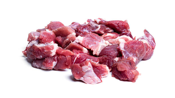 istock Pieces of raw pork isolated on a white background 1313342923