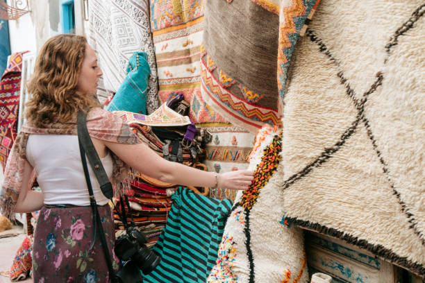 istock A girl touching rugs on the wall 1313343041