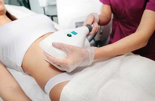 Cryolipolyse and body contouring treatment, anti-cellulite and anti-fat therapy in beauty salon