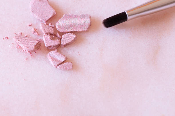 istock Cosmetics on pink marble background 1313344211