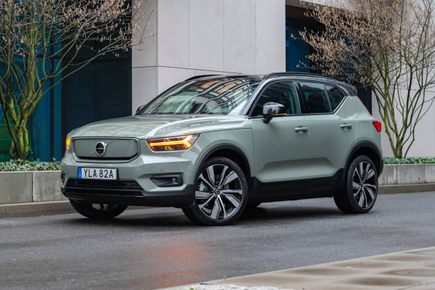 Volvo XC40 Recharge on a street Berlin, Germany - 16th April, 2021: Electric SUV Volvo XC40 Recharge on a street. This model is the first mass-produced electric car from Volvo. volvo photos stock pictures, royalty-free photos & images