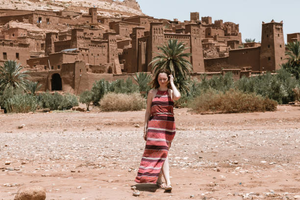 istock Girl coming from Ouarzazate ruins 1313346914