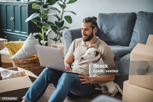 Moving Day Stock Photo - Download Image Now - Laptop, Relocation, Men