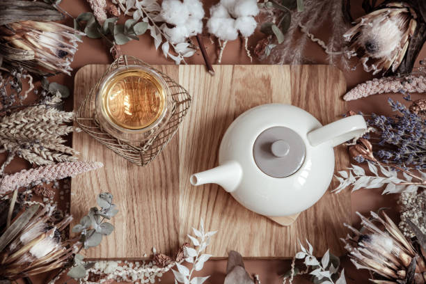 istock Spa composition with dry wildflowers and herbal tea close up. 1313348041