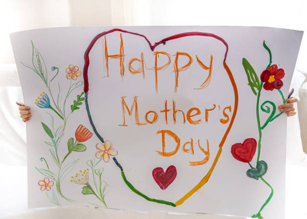 istock Children's drawing-congratulations to mother's day, painted with paints. 1313349558
