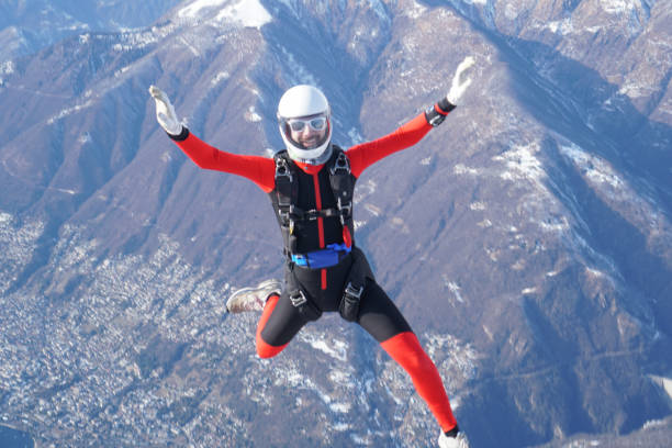 istock Freefall jumper soars above Swiss mountain landscape 1313350294