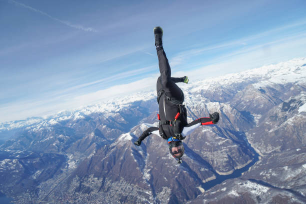istock Freefall jumper soars above Swiss mountain landscape 1313350482