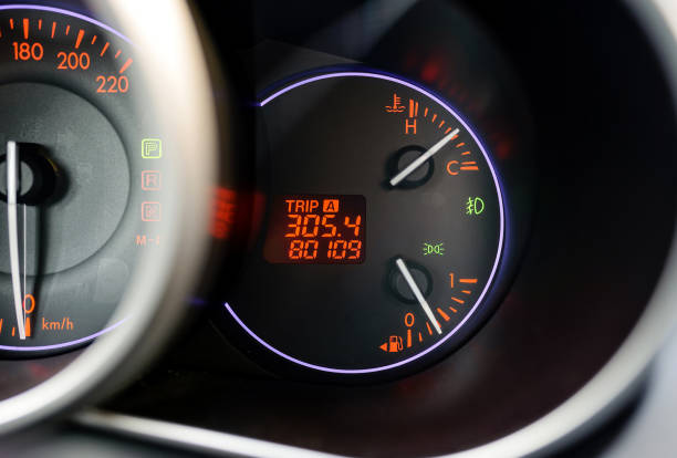 istock Modern car red blue illuminated dashboard with vehicle mileage 1313350628