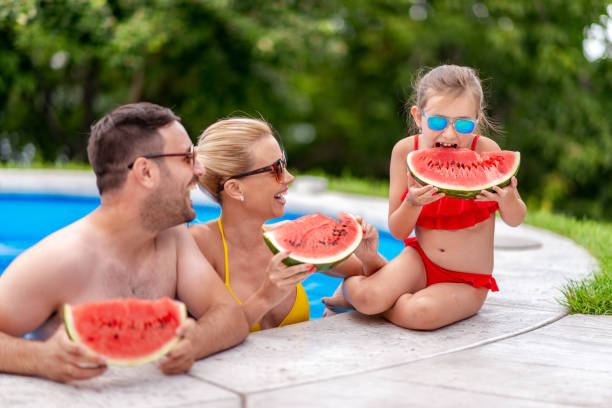 istock Relaxing in swimming pool 1313353456