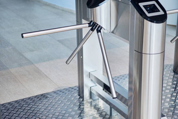Iron bars of the turnstile for the passage of visitors stock photo