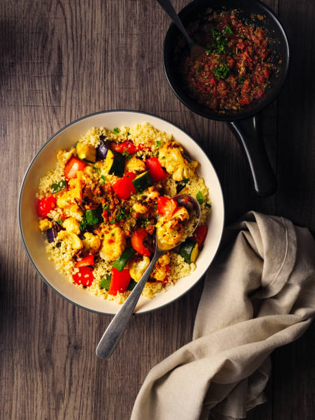 healthy roasted vegetable with couscous vegan bowl - dieting front view vertical lifestyles imagens e fotografias de stock