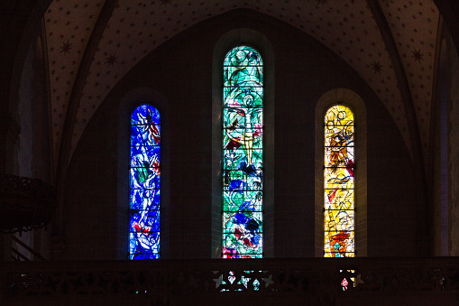 Zurich, Switzerland - April 19. 2021 : stained glass window of the Protestant church Fraumunster designed by Marc Chagalll