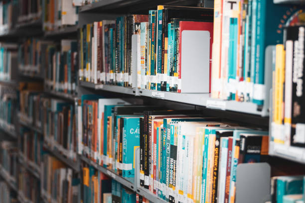 estante de libros - biblioteca fotografías e imágenes de stock