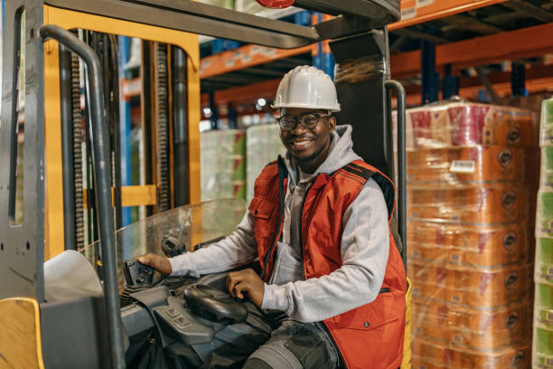 istock Young attractive woman working in the warehouse 1313361140