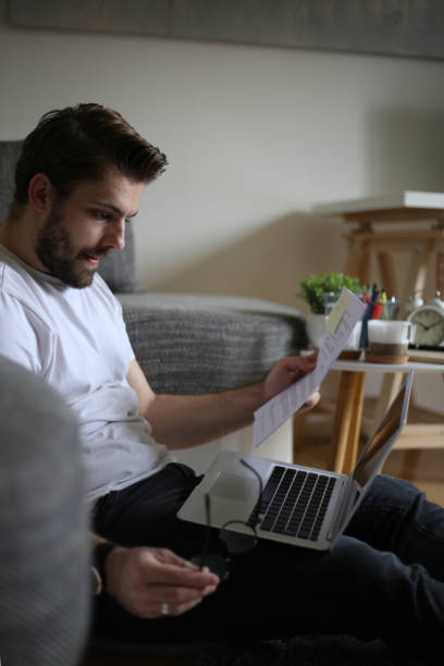 istock I'm drowning in bills stock photo 1313362625