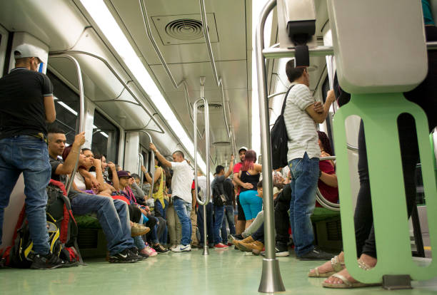 People in subway train (metro) People in subway train (metro). wagon interior in Medellin, Colombia, photo take on 05/08/2017 metro medellin stock pictures, royalty-free photos & images