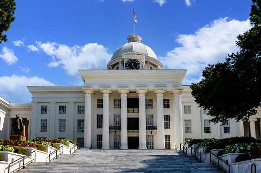 In Orlando, United States the historic courthouse downtown has columns marking the entrance of the building.