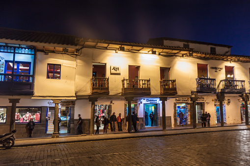Cuzco, Peru - May 23, 2015: Colonial houses at Plaza de Armas square in Cuzco, Peru.