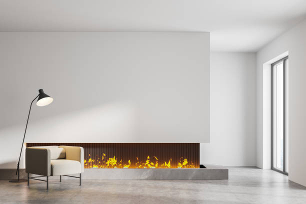 istock White room interior with fireplace, armchair and lamp, mockup 1313366996