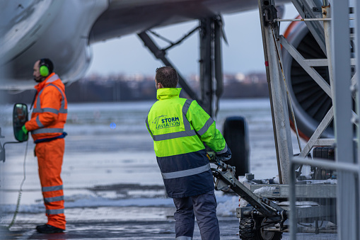 London southend airport, southend, England, February 27 2018. Ground crew had been preparing aircraft for flights during the winter and in snow and ice conditions.