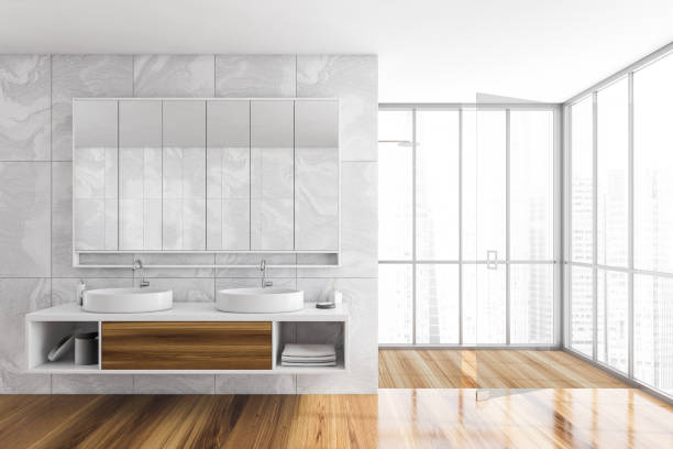 istock Bathroom interior. Two sinks with mirrors and shower with glass doors 1313368652