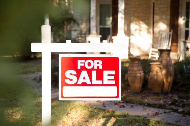 istock Home for sale with real estate sign.  Front Yard. 1313368718