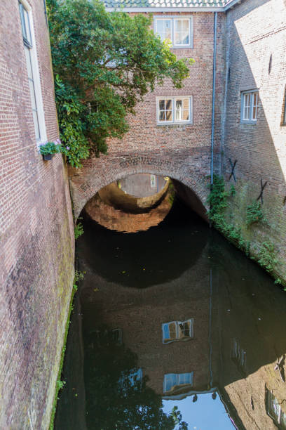istock Old houses and a canal in Den Bosch, Netherlan 1313373413