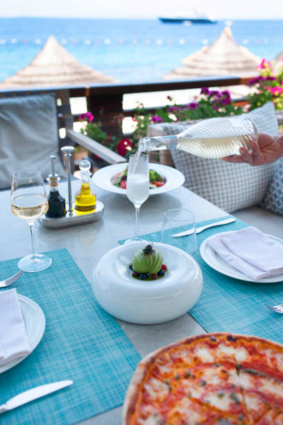 istock Champagne with Dinner tables near the sea 1313373463