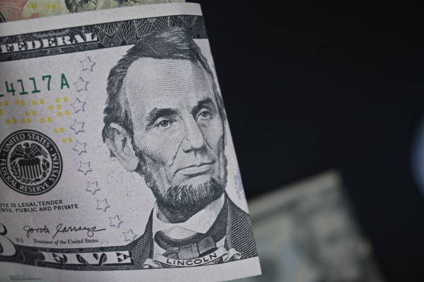 istock Abe Lincoln $5 US Currency Detailed 1313379076