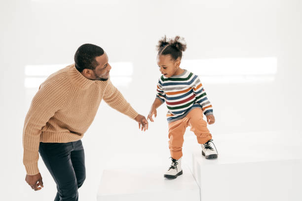 istock Shared happiness - toddler with parent 1313379339