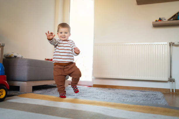 istock One happy little boy walking around the house 1313379382