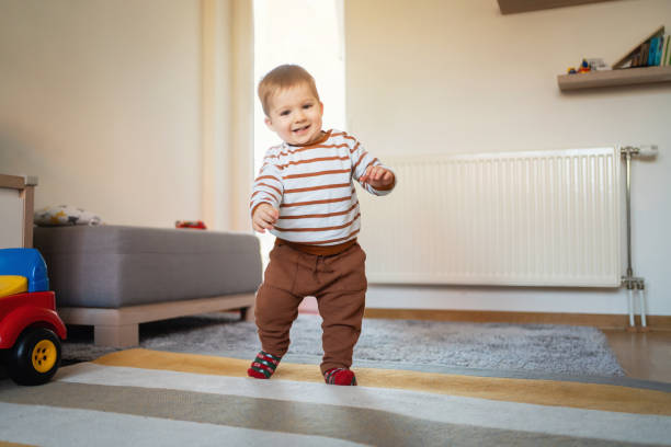 istock Happy little boy walking around the house 1313379392