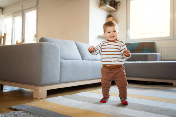 istock One little boy walking around the house 1313379395