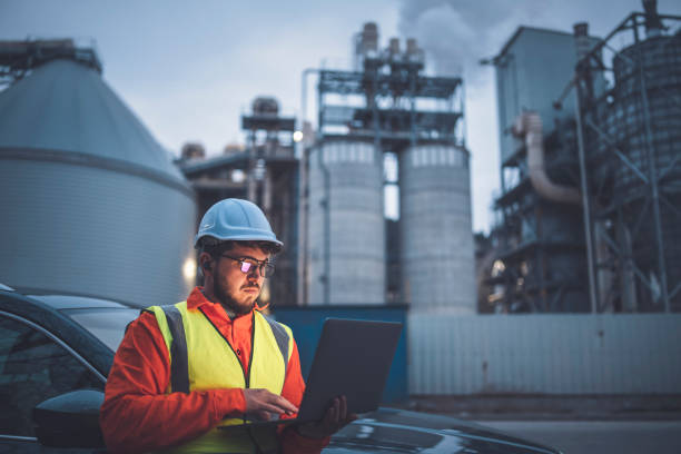 istock Young engineer working hard during night in oil and gas industry. 1313379491