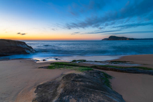 istock Sunrise seascape with scattered high cloud 1313381850