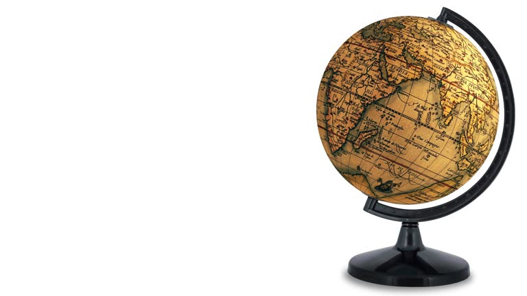 Looping antique globe with room for copy, spins continuously on white background