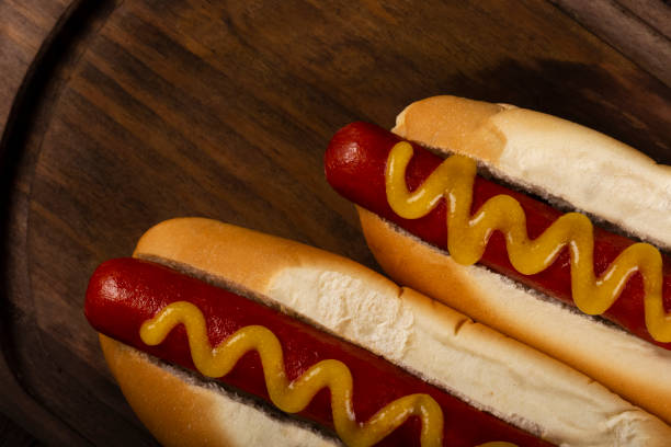 istock Hot dog with ketchup and yellow mustard. 1313385609