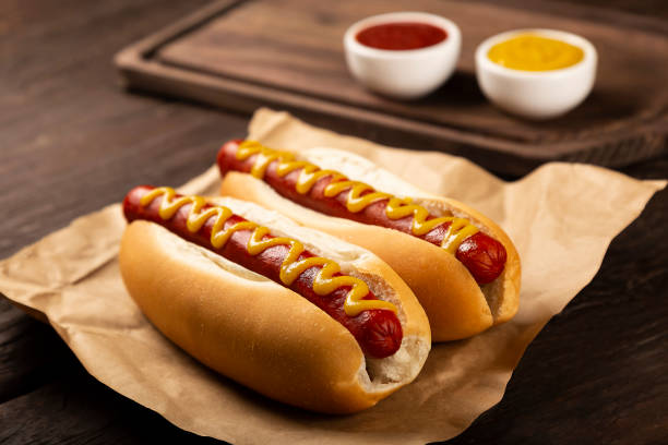 istock Hot dog with ketchup and yellow mustard. 1313385620
