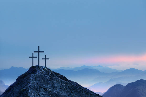 istock Three Crosses On A Hill At Sunrise 1313386992