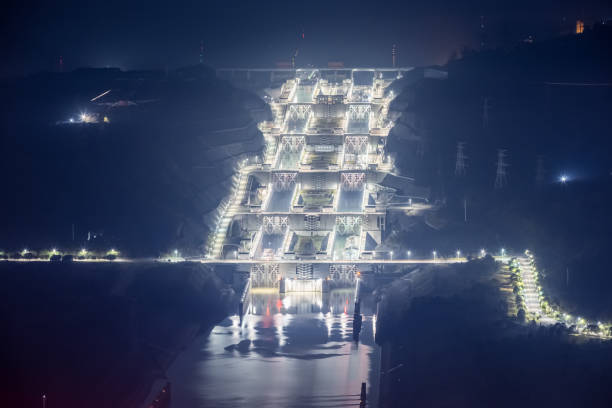 three gorges ship lock at night three gorges double-line five-grade ship lock at night, the largest navigation facility in the world, yichang city, hubei province, China three gorges photos stock pictures, royalty-free photos & images